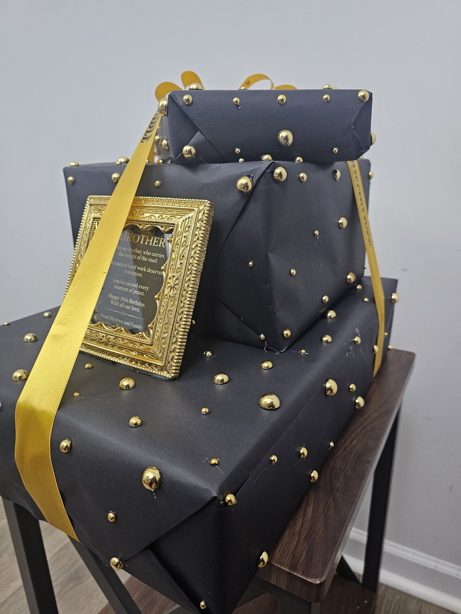 Black and gold custom birthday gift stack
