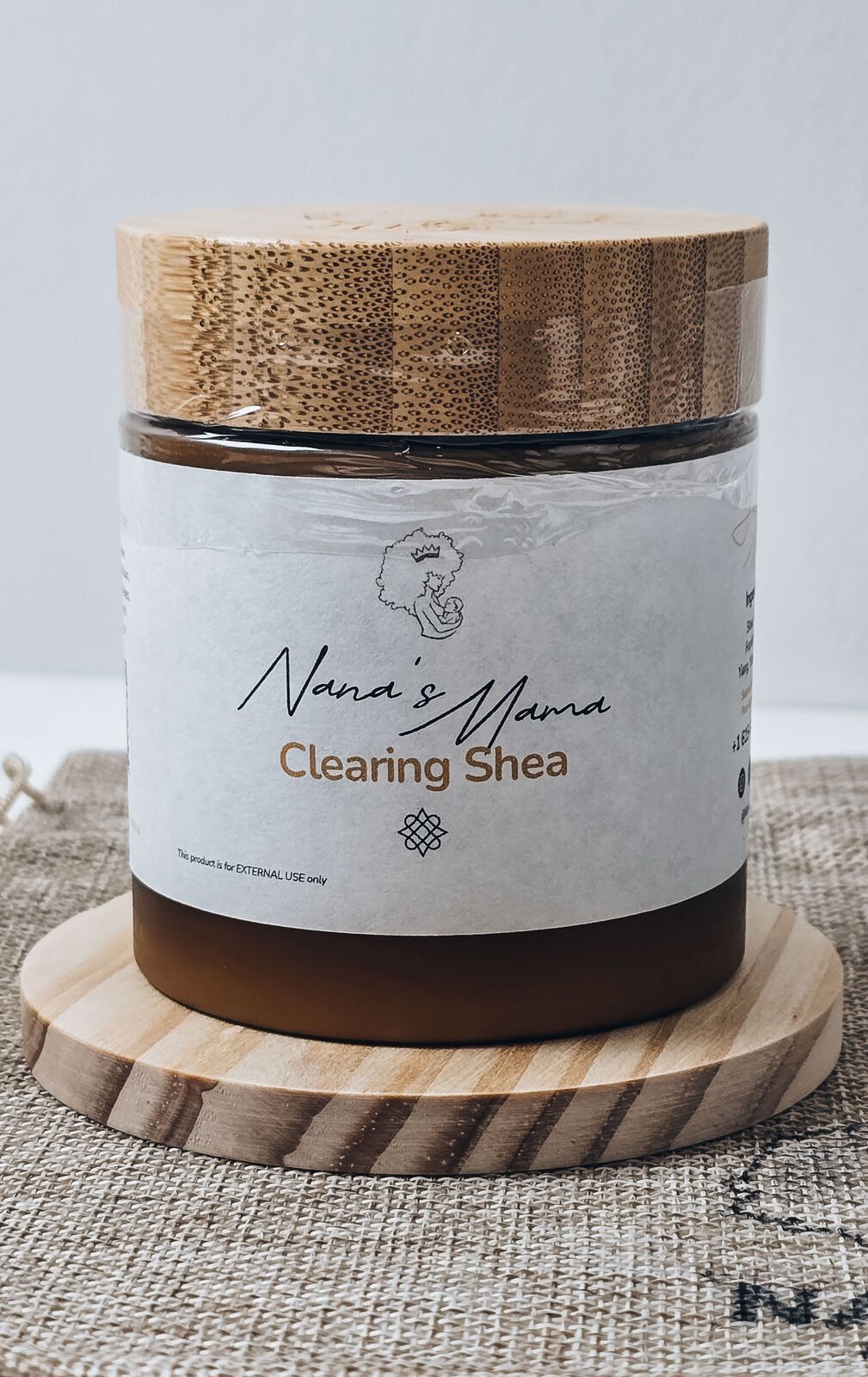 Clearing shea butter jar front view